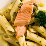 Savory Symphony: Pasta with Pesto and Salmon Delight