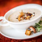 Savor the Earth: Wild Mushroom Soup Infused with Truffle Oil