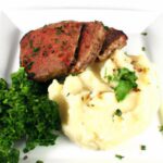 Savor Garlic Butter Steak Bites with Cheesy Smashed Potatoes