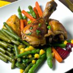 Savory Baked Chicken Legs and Veggies: A One-Pan Feast